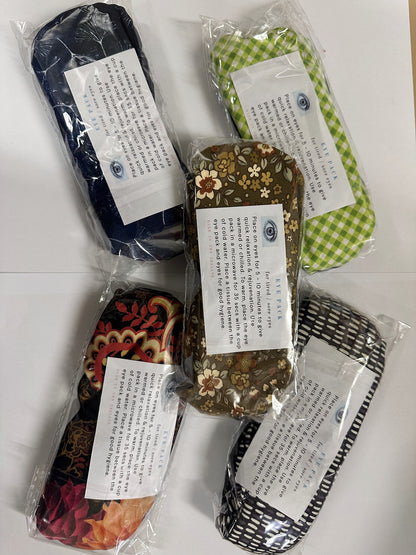Eye Pack microwavable wheat bags in five fabric prints, individually wrapped, made in New Zealand