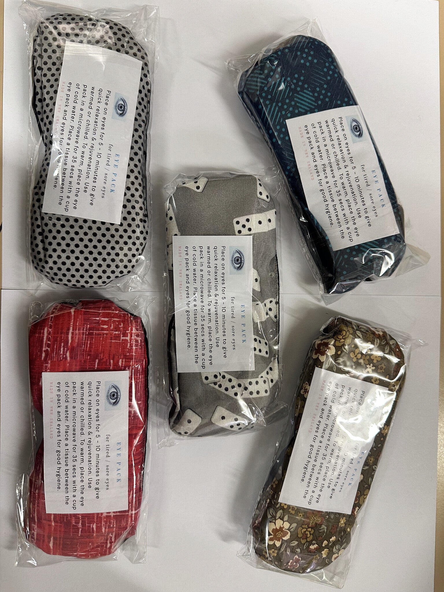 Eye Pack wheat bag warm compresses in assorted fabric prints, sealed packs, made in New Zealand