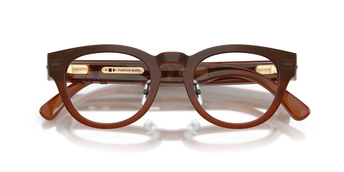 Nuance Audio Plus Panthos 48 hearing glasses in amber, folded