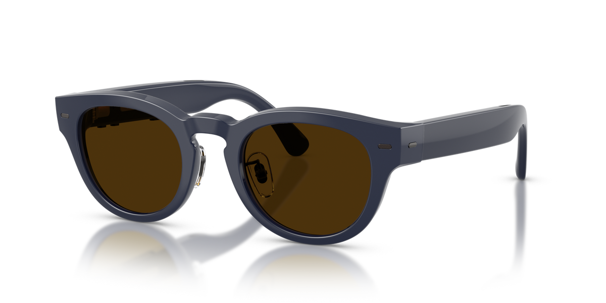 Nuance Audio Plus Panthos 48 hearing glasses in deep blue, Transitions Clear to Amber lenses