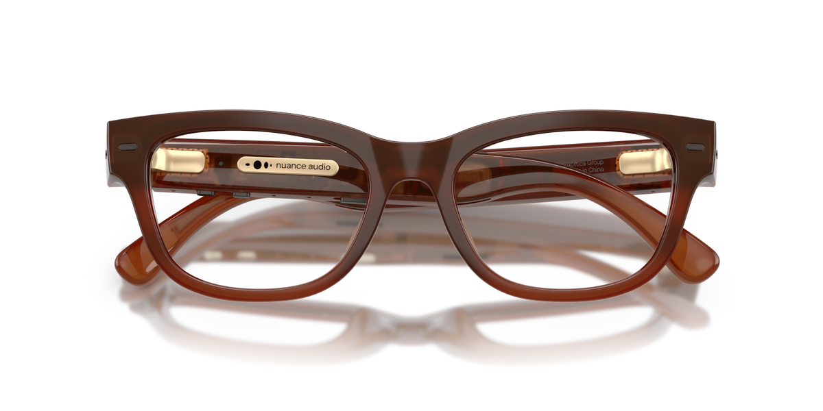 Nuance Audio Plus Upturn 52 hearing glasses in amber, folded