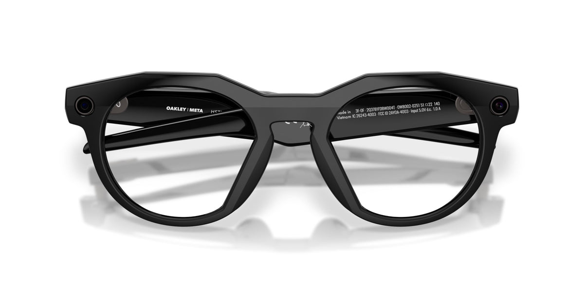 Oakley Meta HSTN Polished Black / Clear to Amethyst Transitions — front, lenses clear