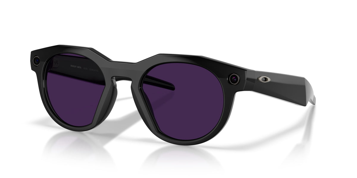 Oakley Meta HSTN Polished Black / Clear to Amethyst Transitions — lenses activated