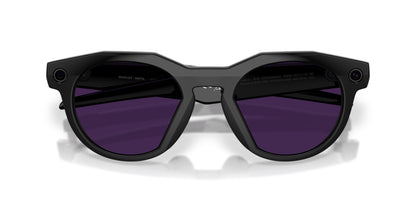 Oakley Meta HSTN Polished Black / Clear to Amethyst Transitions — lenses activated, three-quarter