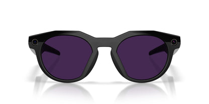 Oakley Meta HSTN Polished Black / Clear to Amethyst Transitions — lenses activated, angled