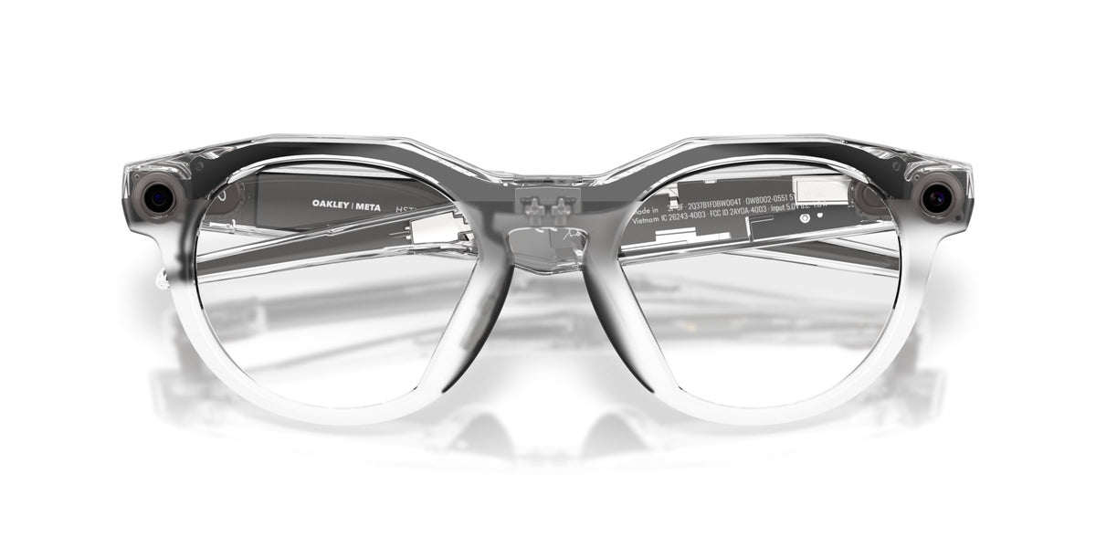 Oakley Meta HSTN Polished Clear / Clear to Grey Transitions — front, lenses clear