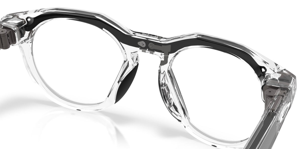 Oakley Meta HSTN Polished Clear / Clear to Grey Transitions — angled right