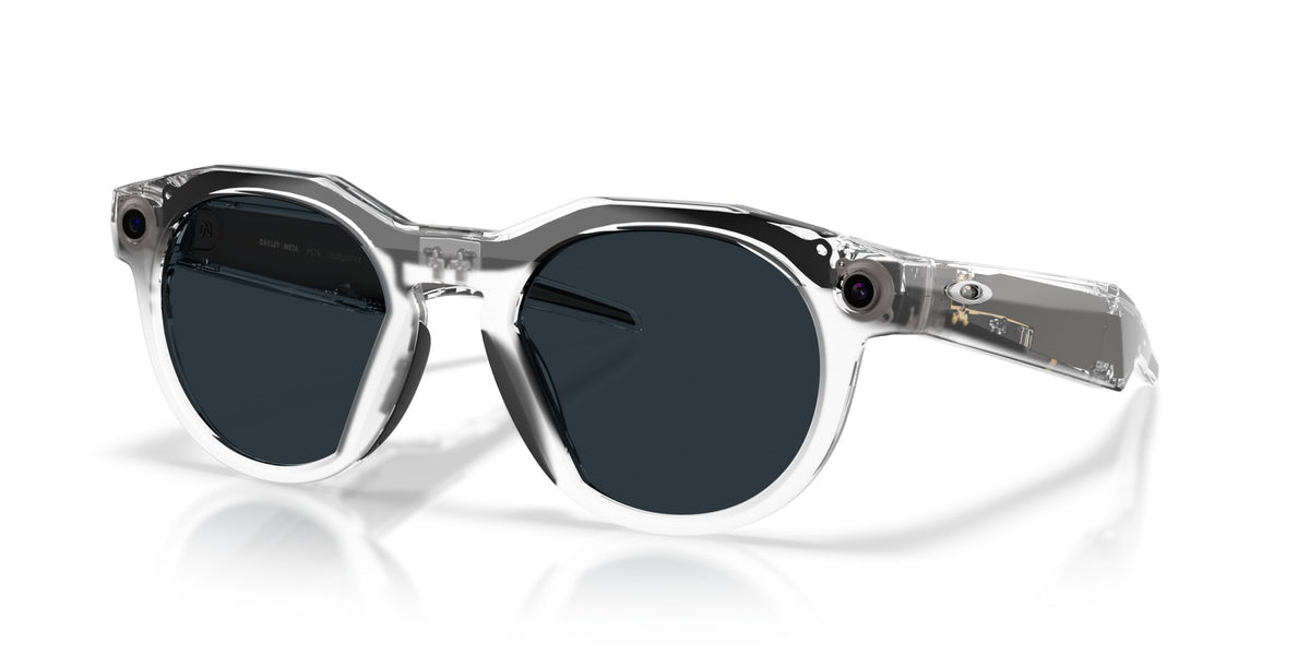 Oakley Meta HSTN Polished Clear / Clear to Grey Transitions — lenses activated