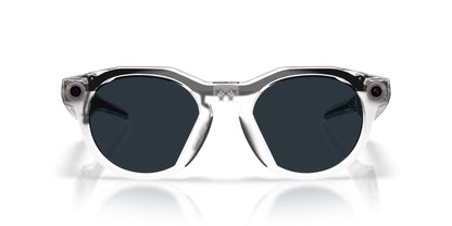 Oakley Meta HSTN Polished Clear / Clear to Grey Transitions — lenses activated, angled