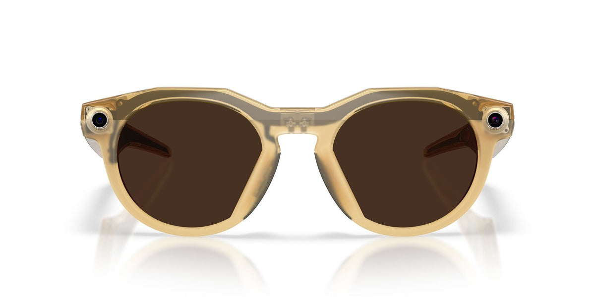 Oakley Meta HSTN Light Curry / Transitions Brown — lenses activated, angled